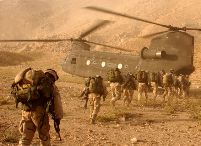 Operation Mountain Viper put the soldiers of A Company, 2nd Battalion 22nd Infantry Division, 10th Mountain in the Afghanistan province of Daychopan to search for Taliban and or weapon caches that could be used against U.S. and allied forces. Soldiers quickly walk to the ramp of the CH-47 Chinook cargo helicopter that will return them to Kandahar Army Air Field. (U.S. Army photo by Staff Sgt. Kyle Davis) (Released)