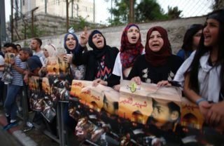 Palestinian placards for Mohammed Abu Khdeir May 2016