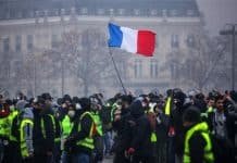 Macron backs down in face of French Revolution
